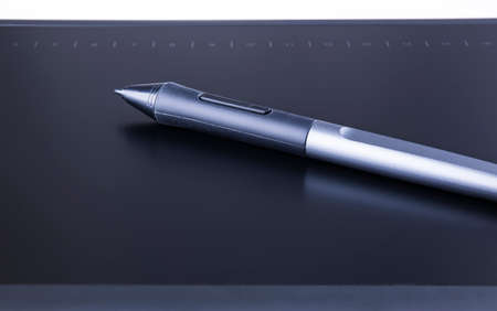 Close up of graphic tablet with pen