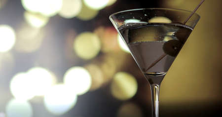 Martini Cocktail Poured And Olives Added.の写真素材