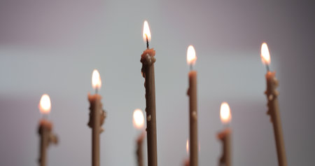 Candles burning on a church altar. Burning a candles on blurred background
