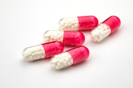 Close up of medical capsules on blue background