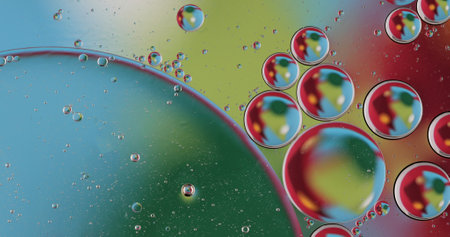 Oil bubbles on water abstract form in glass tank