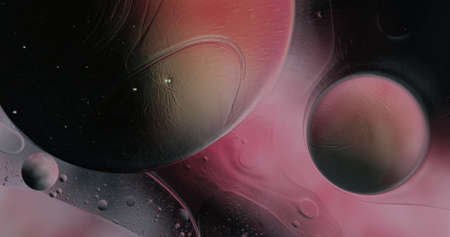 Oil bubbles on water abstract form in glass tank