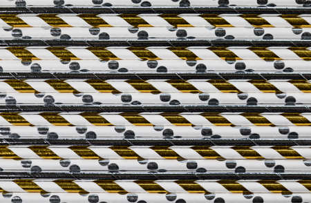 Rolls of festive wrapping paper as backgroundの写真素材