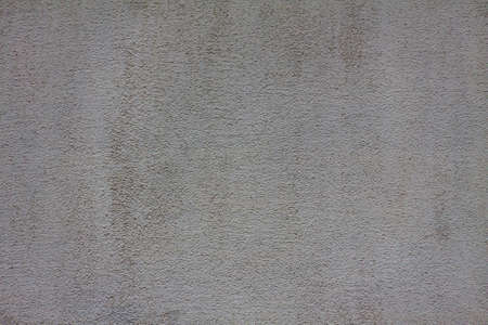 Gray cement plaster wall as background or texture