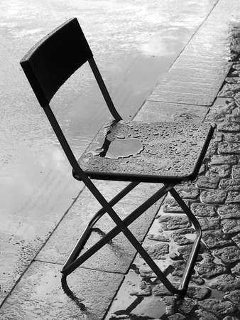 Close-up shot of a weathered street bench on the promenade.の写真素材