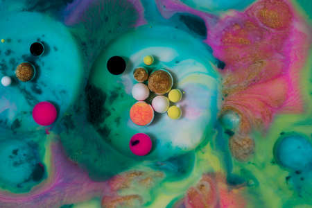 Beautiful acrylic color abstract background. Colored marble mixed ink abstraction.
