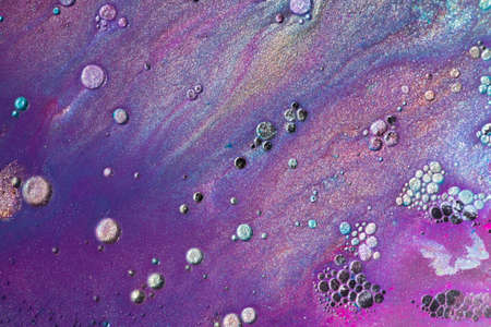 Beautiful acrylic color abstract background. Colored marble mixed ink abstraction.の写真素材