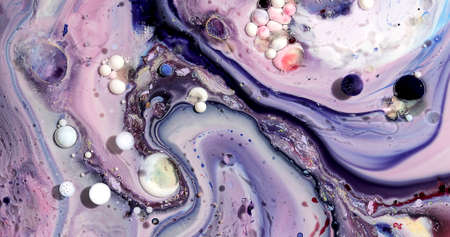 Beautiful acrylic color abstract background. Colored marble mixed ink abstraction.