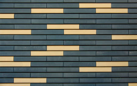 Textured oblong ceramic tiles in warm colors.の写真素材