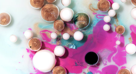 Amazing bubbles of milk and Oil. Drops of paint. Fantastic background.の写真素材