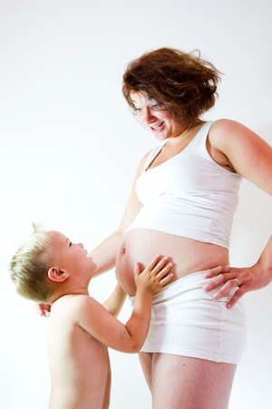 Young boy excited about the newborn.の写真素材