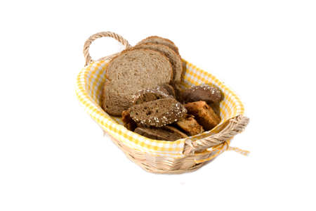 A basket filled with a variety of bread.の写真素材
