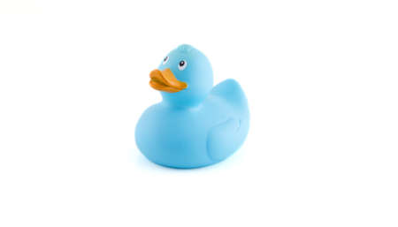 Blue rubber duck for in bath and the baby.の写真素材