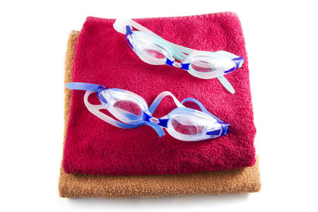 Two pair of goggles and towels.の写真素材