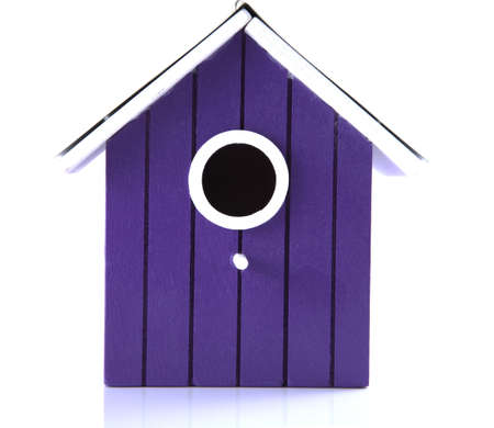 Purple bird house on a white background.の写真素材