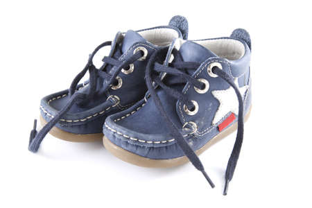 Blue pair of shoes on a white background.