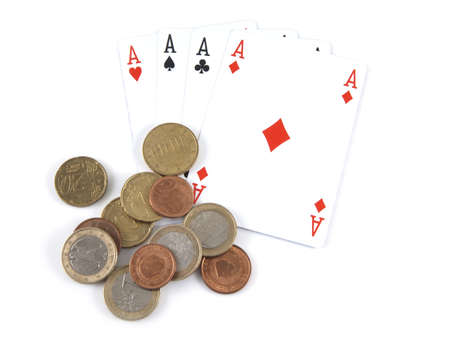 Aces and money on a white background.