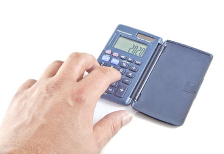 Calculating on a white background.の写真素材