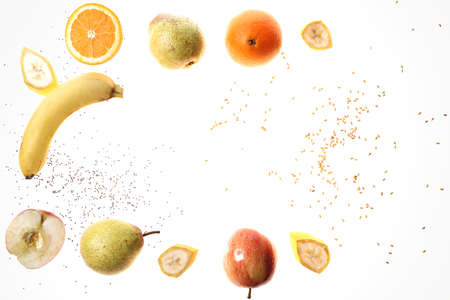 A healthy fruit diet. Orange, pear apple, banana chia seed and linseed isolated on a white...