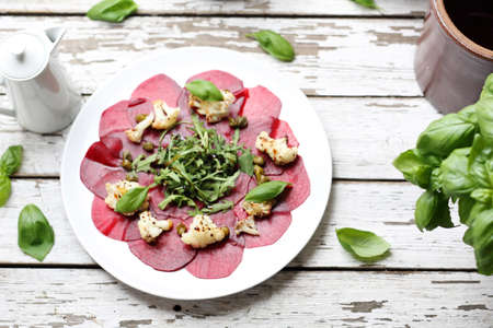 An elegant, light vegetable appetizer. Horizontal composition, top viewの写真素材