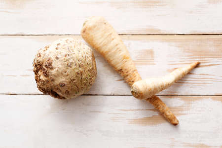 Vegetable composition on white wooden background. Place for textの写真素材