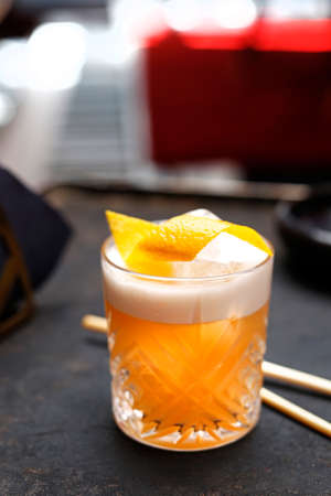 Orange cocktail. A refreshing fruit cocktail. Sweet drink with orange. A refreshing fruit cocktail.の写真素材