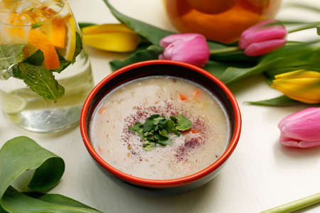 Horseradish soup with vegetables. A colorful appetizing dish. Culinary photography, food styling.の写真素材
