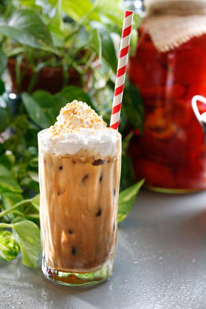 Iced coffee with whipped cream.