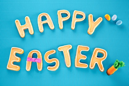 Happy Easter Card On Textured Turquoise. Words HAPPY EASTER on a textured turquoise background,...