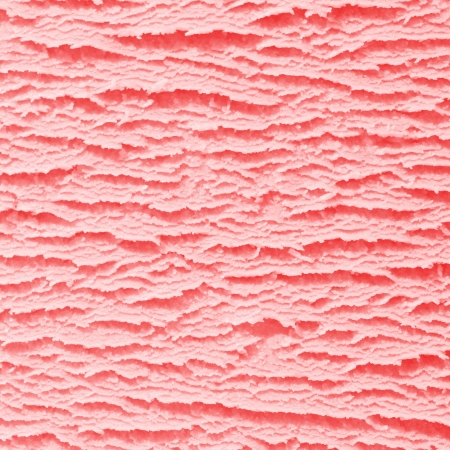 Macro background of the surface texture of a scoop of creamy strawberry icecream in square formatの写真素材