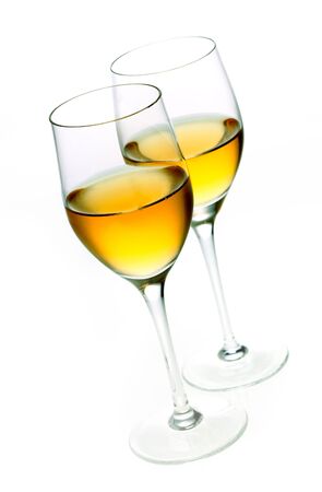 Two glasses of sherry isolated on whiteの写真素材
