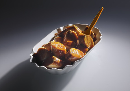 Sliced Ready to Eat Tasty Sausage on Gray Backgroundの写真素材