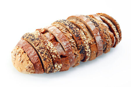 Close up Delicious German Roll Bread Slices with Sesame and Pumpkin Poppy Seeds Isolated on White...