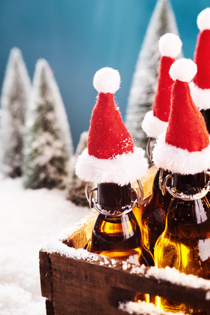 Fresh draught winter beer in a wooden tray in Wintery countryside, for winter bbq conceptsの写真素材