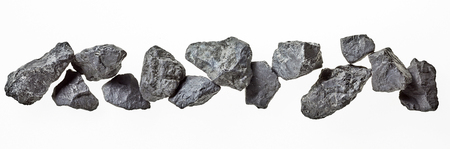 Banner of natural Russian shungite stones isolated on white used in alternative medicine to purify...