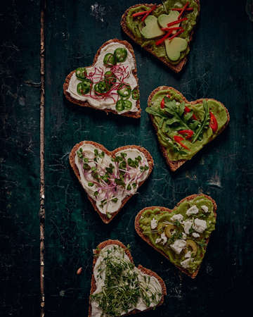 High angle of assorted food and drinks for breakfast arranged on bright yellow backgroundの写真素材