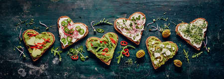 High angle of assorted food and drinks for breakfast arranged on bright yellow backgroundの写真素材