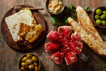 High angle of assorted food and drinks for breakfast arranged on bright yellow backgroundの写真素材