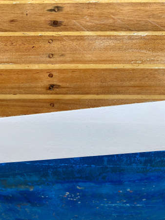 Creative textured background of shabby wooden panels painted with blue and white colorsの写真素材