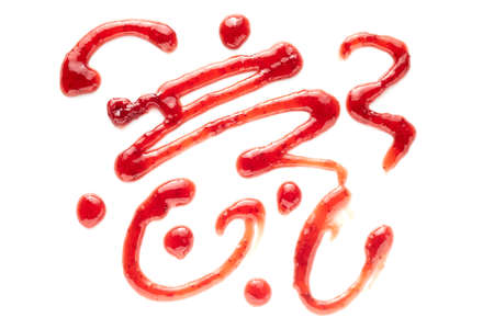 Random pattern of flowing squiggles of red jam isolated on white in an overhead view for decorative design elementsの写真素材