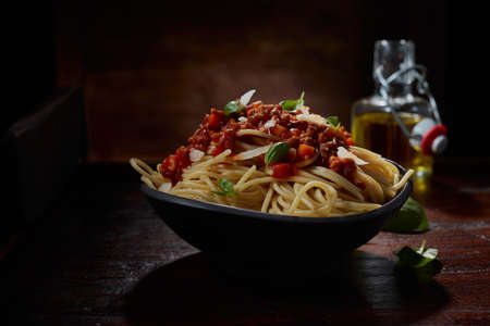 Vector illustration of golden loading bar symbolizing New Year 2022 with lettering and blinking sparkles on black backgroundの写真素材