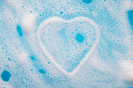 Outside shape of a heart in foamの写真素材