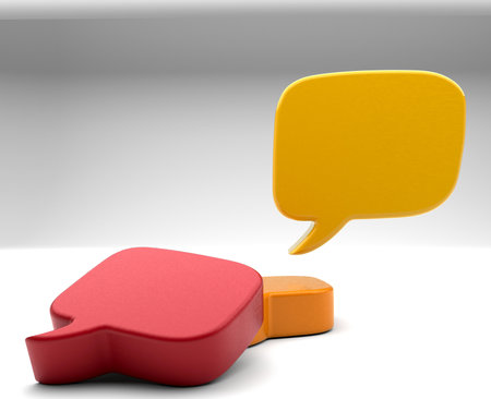 3D illustration of empty red yellow and orange speech balloons against gray background in studioの写真素材