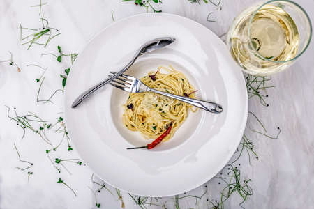Delicious dish of pasta decorated with red pepper pod
