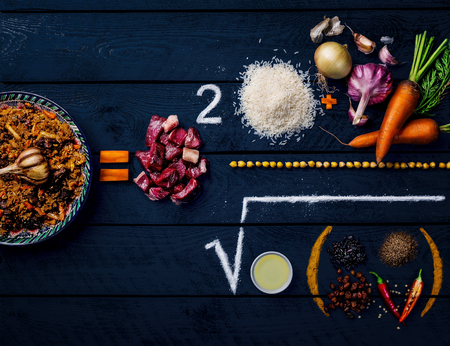 Pilaf and ingredients. How to Cook Pilaf. Central-Asian cuisine - Plov. Top view dark wooden backgroundの写真素材