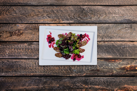 Salad of duck in cranberry sauceの写真素材