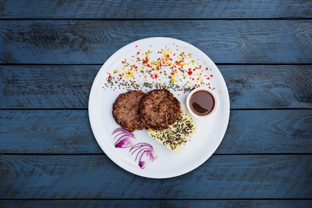Cutlets from veal with mashed potatoes.