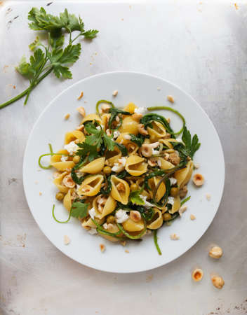 Plate of typical food Italian, shells of pasta with tops of turnipの写真素材