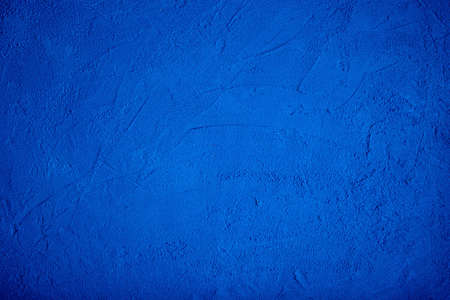 Dark blue textured background. Abstraction