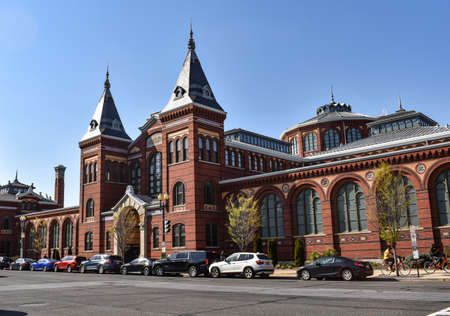 Washington, DC, USA - April 4, 2021: Smithsonian Castle Viewed from the National Mall